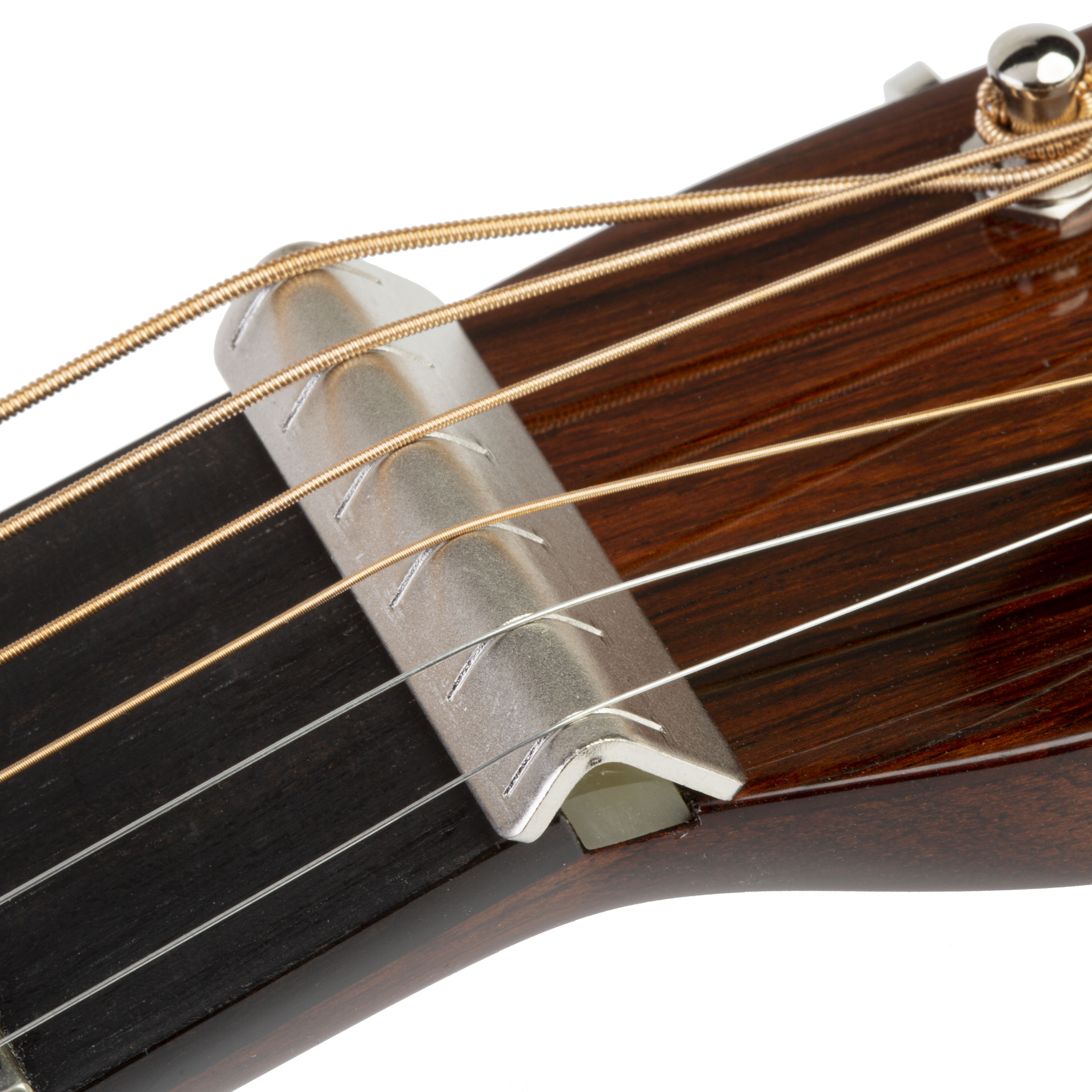 Desliza la cejuela de extensión de guitarra