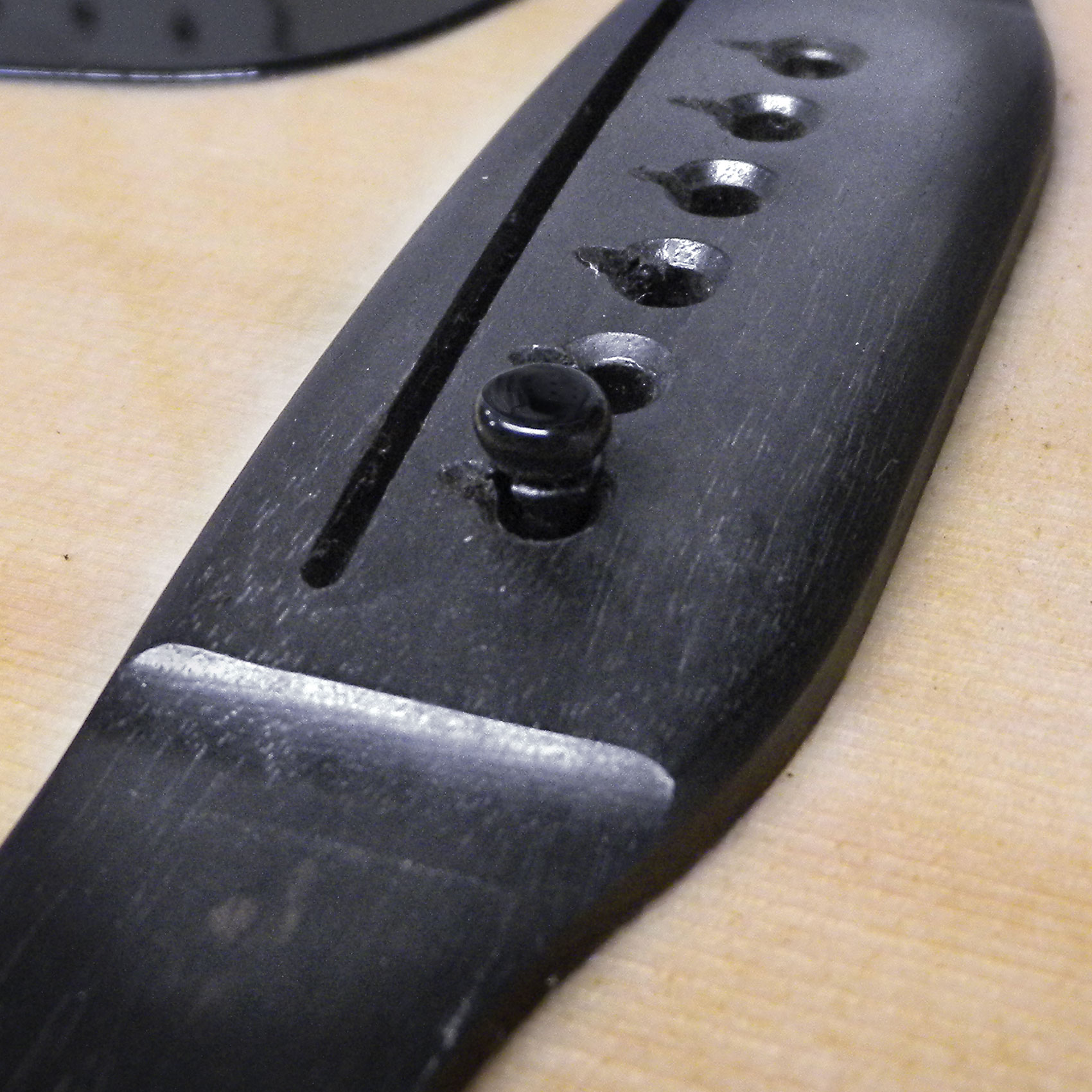 Tapones de reparación de orificios de pasador de puente