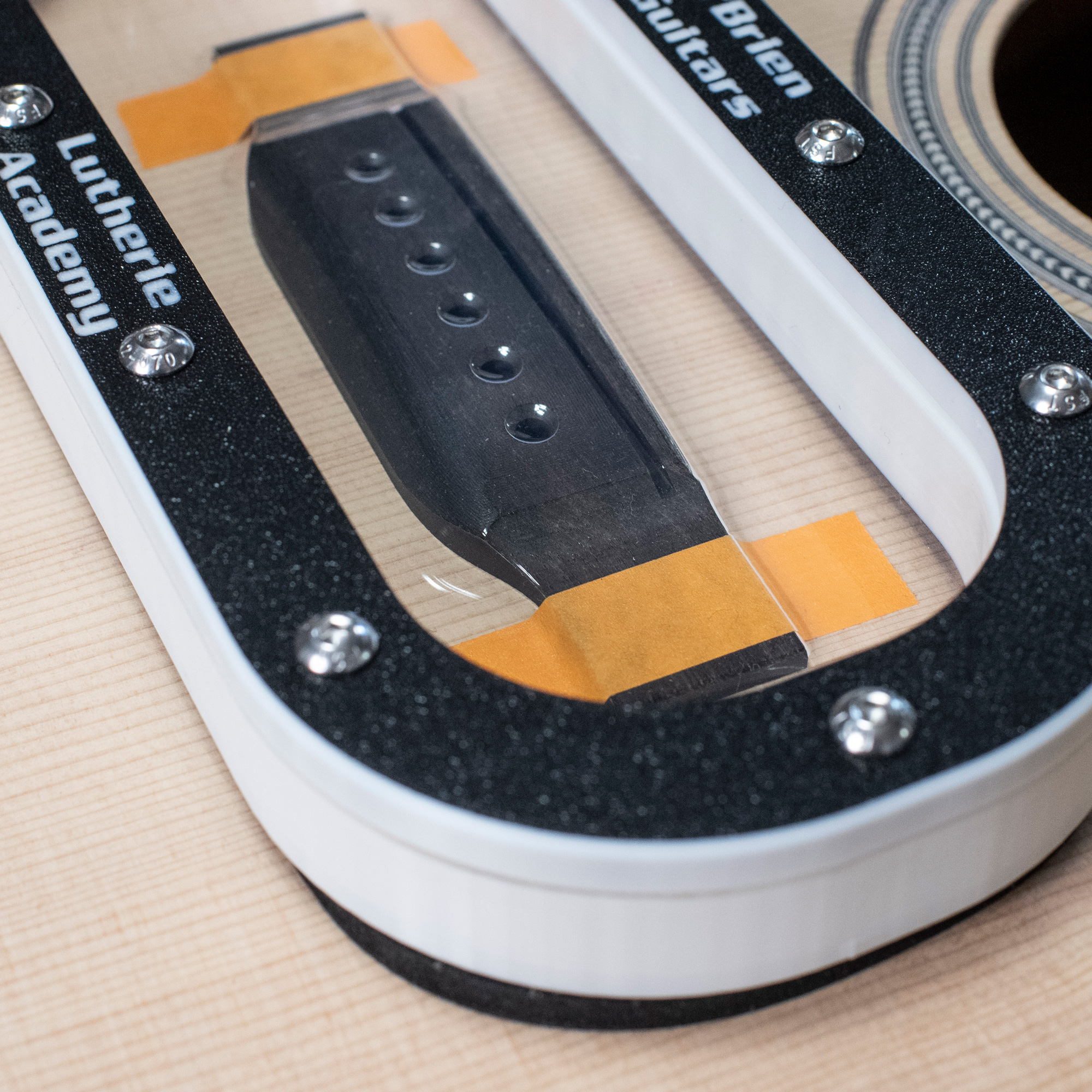 Abrazadera de vacío de puente