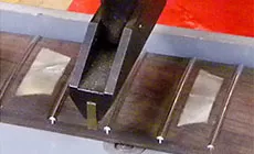 Primer plano de la prensa del eje