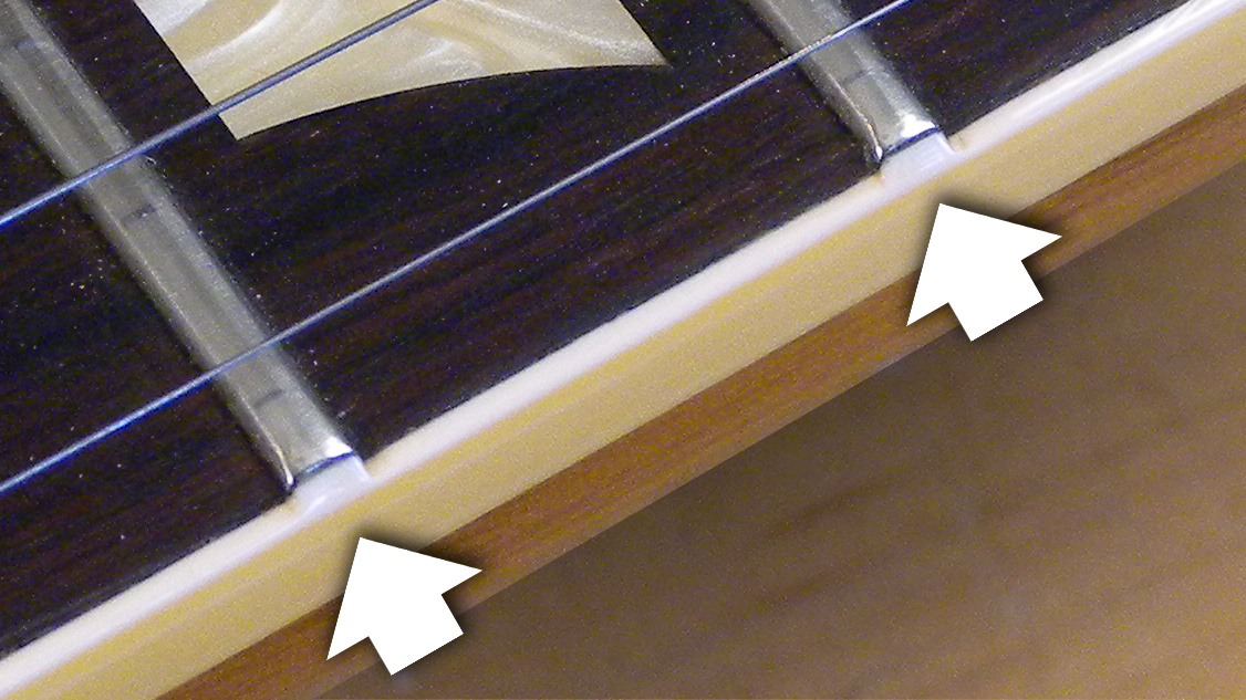 Cómo unir un diapasón, estilo Gibson