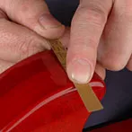 Finalice la reparación con papel de microacabado