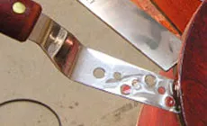 Cuchillo de costura con pegamento