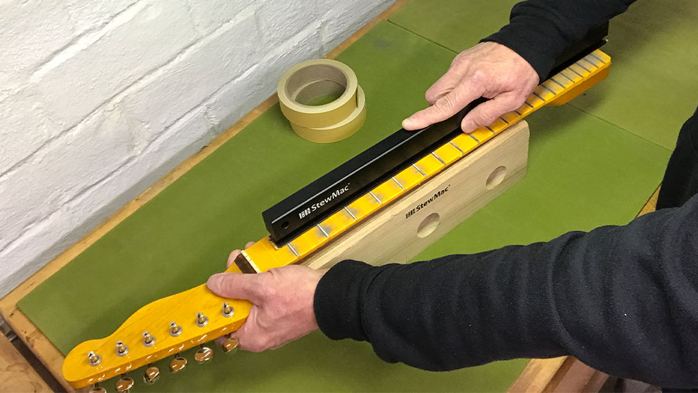 Instrucciones de la Set de Herramientas Nivel de Fret + Vestirse