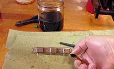 Las salpicaduras pintan el clavijeros