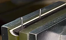 Pasadores en el protector de recogida