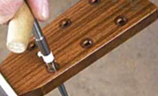 Fresado del orificio de la eje de cuerda 