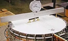 Tensado de la cabeza del banjo