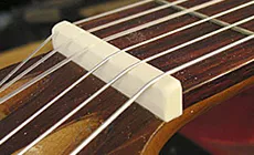 El acabado cejuela para cuerdas