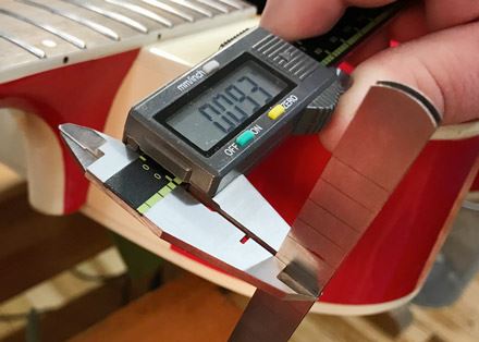 Measuring the thickness of the tapered shim