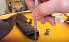 Volver a colocar la cubierta de pastilla 