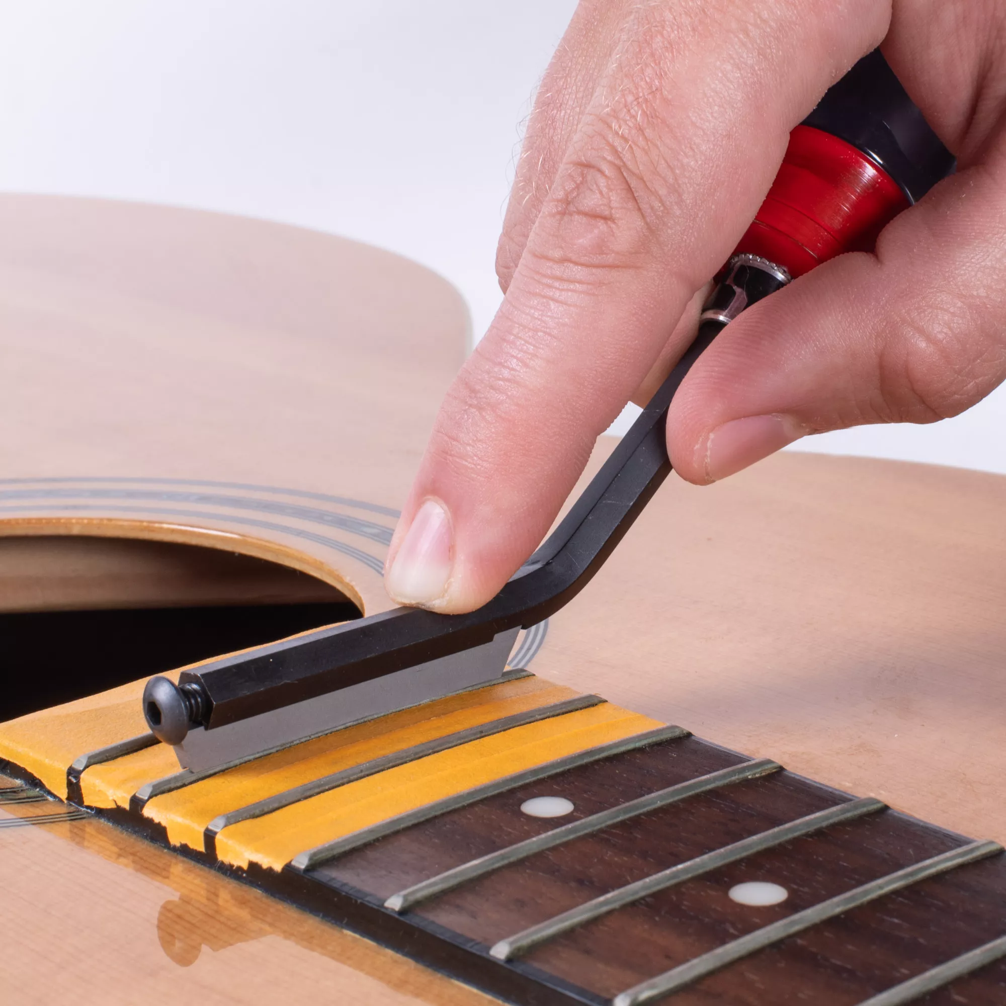 21-choose-a-fret-crow-104313-stewmac-3in1-fret-file.jpg