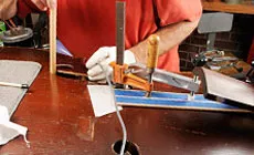 Foto: fijación de la barra de graves