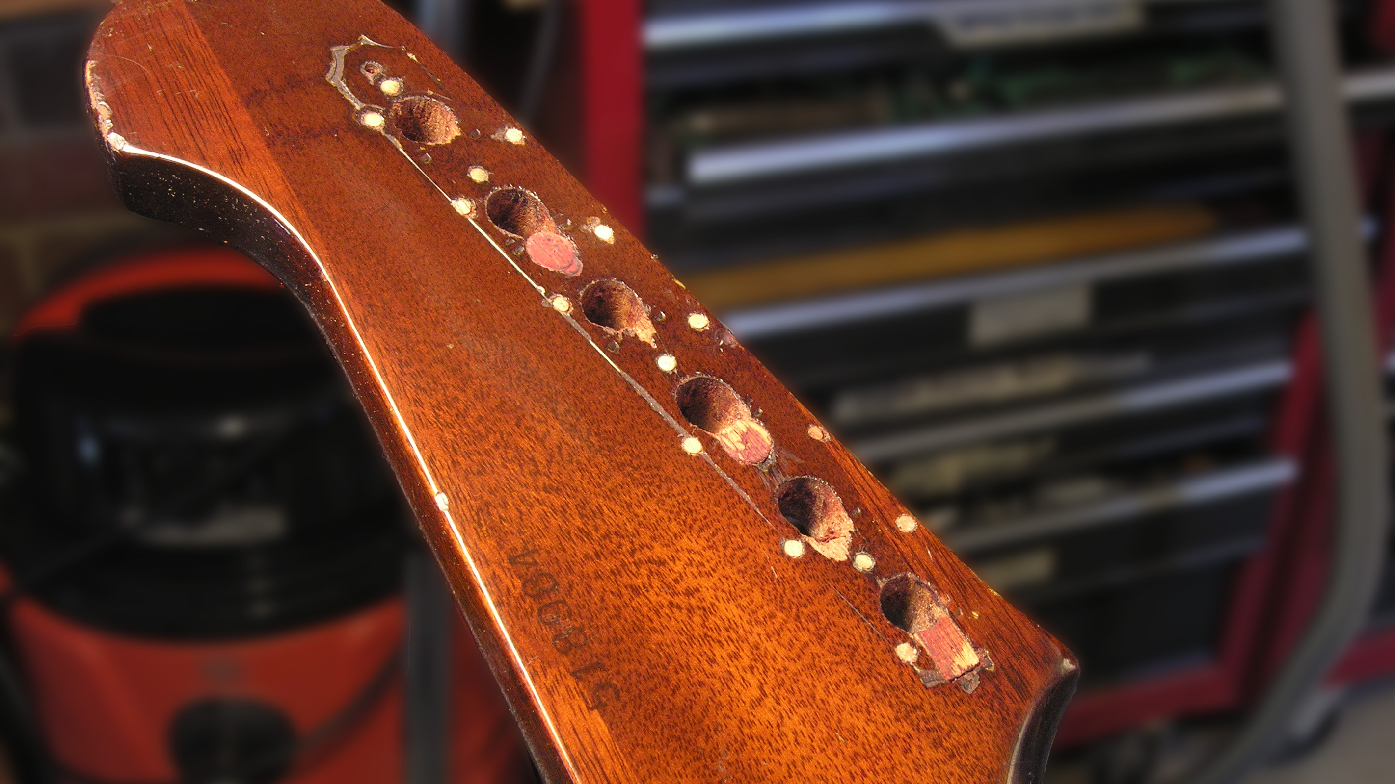 Fixing a 1965 Gibson Firebird with holes in its head! Fixing a 1965 Gibson Firebird with holes in its head!