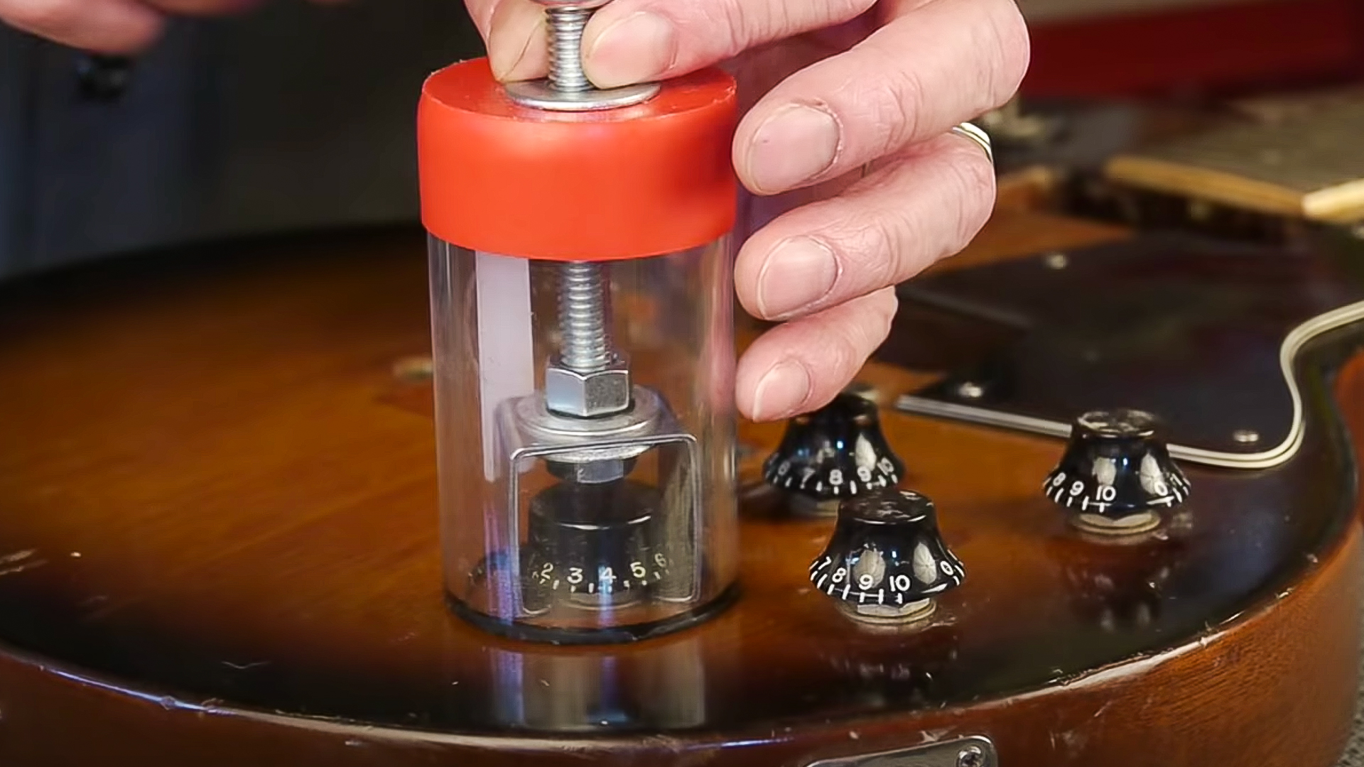 Tirador de perillas de guitarra contra perilla/tirador de casquillos