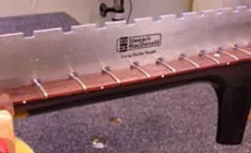 Comprobación de la mástil rectitud del cuello